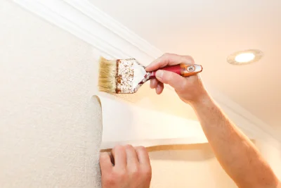 Pose de papier peint à Favars — revêtements muraux et toiles de verre